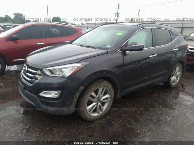 Photo 1 VIN: 5XYZW4LA6GG363280 - HYUNDAI SANTA FE SPORT 