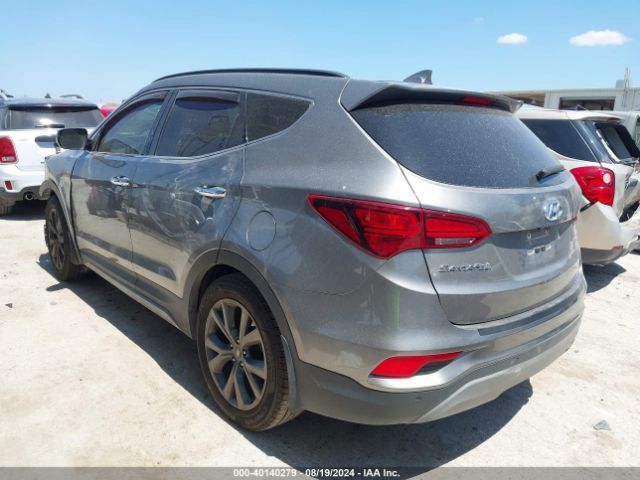 Photo 2 VIN: 5XYZW4LA7JG567268 - HYUNDAI SANTA FE SPORT 