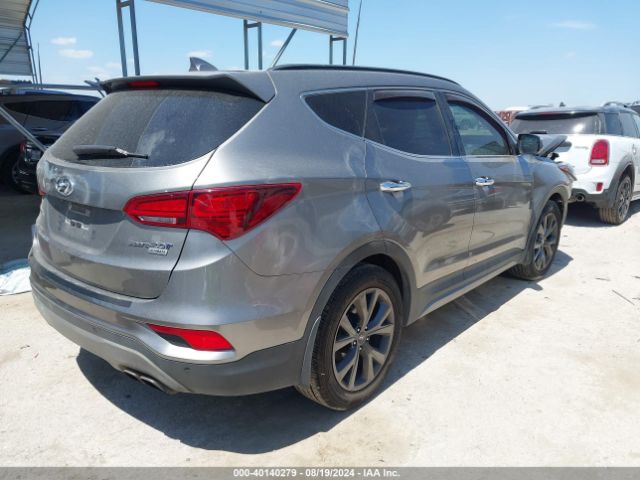 Photo 3 VIN: 5XYZW4LA7JG567268 - HYUNDAI SANTA FE SPORT 