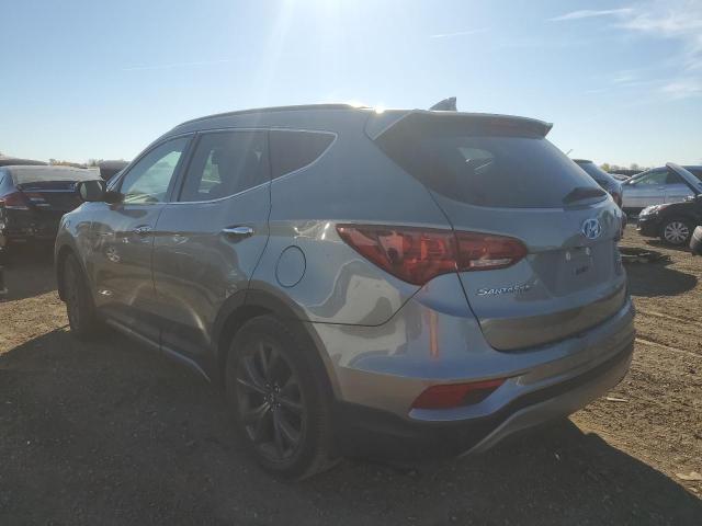 Photo 1 VIN: 5XYZWDLA0JG503704 - HYUNDAI SANTA FE S 