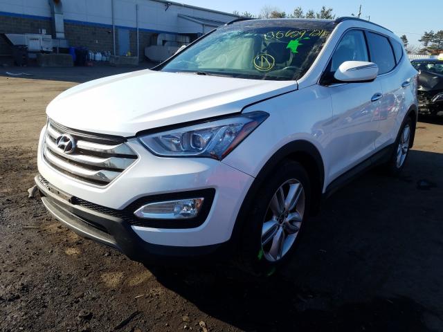 Photo 1 VIN: 5XYZWDLA1GG331692 - HYUNDAI SANTA FE S 