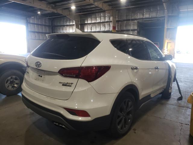 Photo 3 VIN: 5XYZWDLA1JG567816 - HYUNDAI SANTA FE 