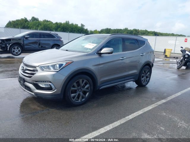 Photo 1 VIN: 5XYZWDLA2JG505938 - HYUNDAI SANTA FE SPORT 