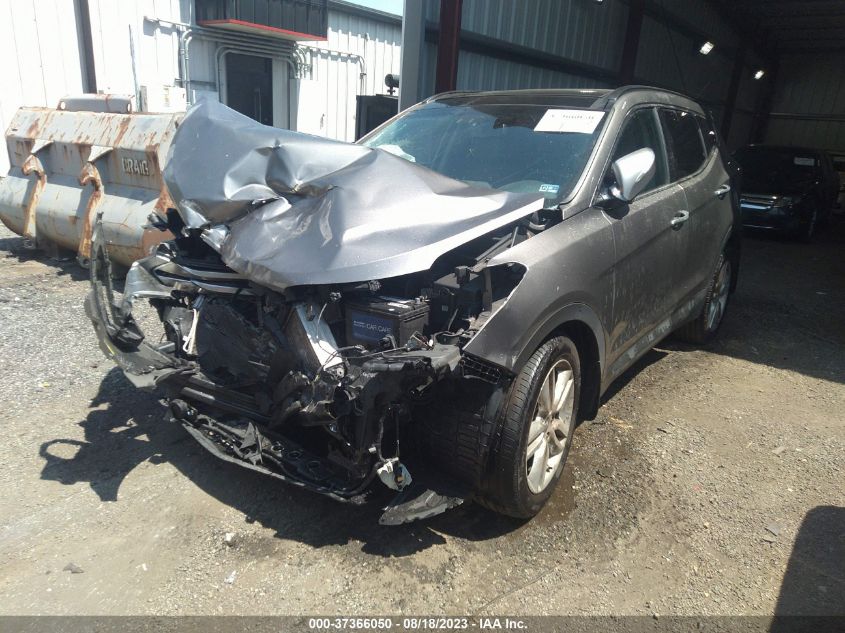 Photo 1 VIN: 5XYZWDLA4GG357977 - HYUNDAI SANTA FE 