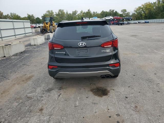 Photo 5 VIN: 5XYZWDLA6HG424502 - HYUNDAI SANTA FE S 