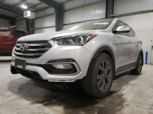 Photo 1 VIN: 5XYZWDLA7JG516143 - HYUNDAI SANTA FE S 