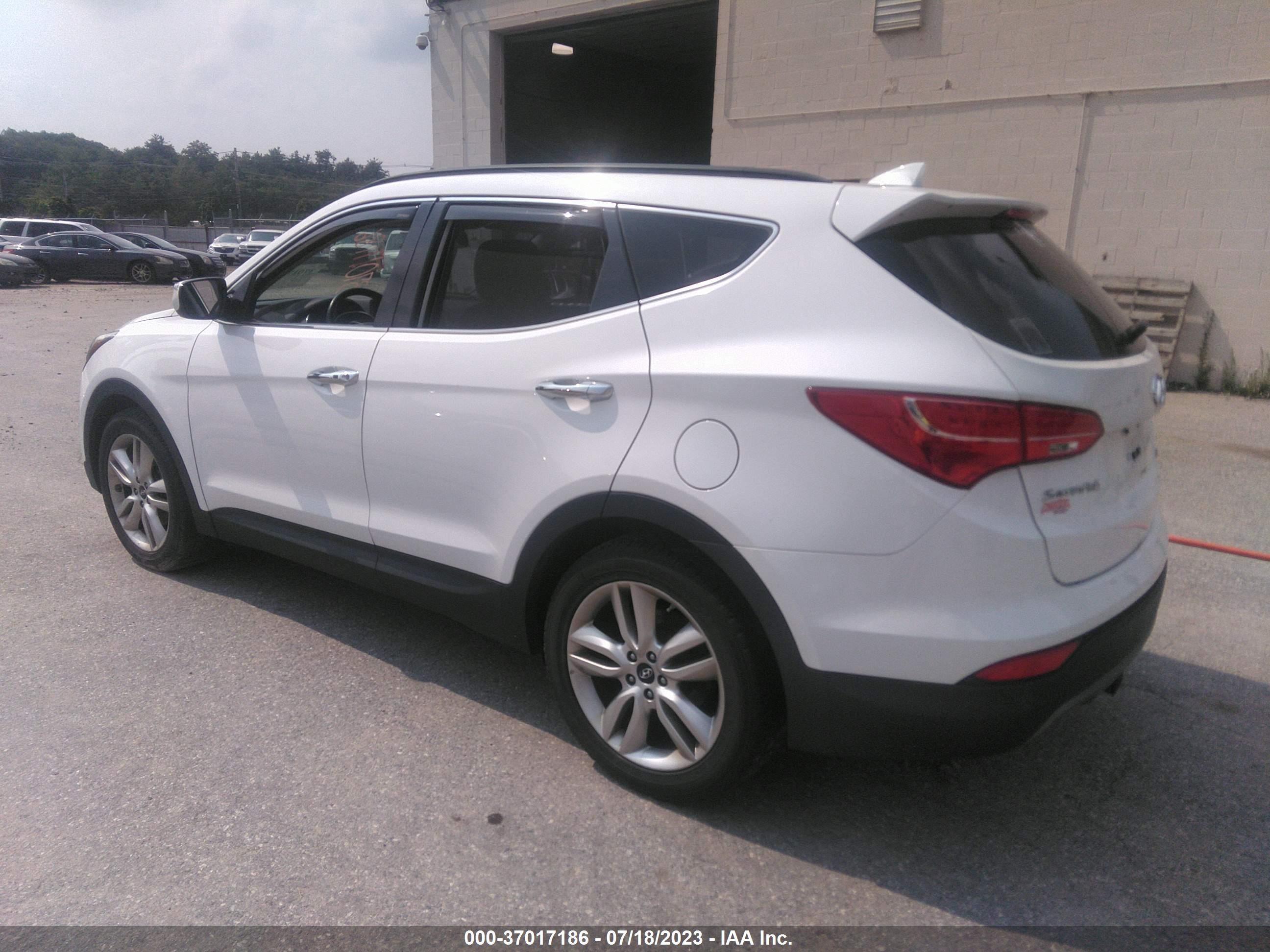 Photo 3 VIN: 5XYZWDLA8GG309026 - HYUNDAI SANTA FE SPORT 