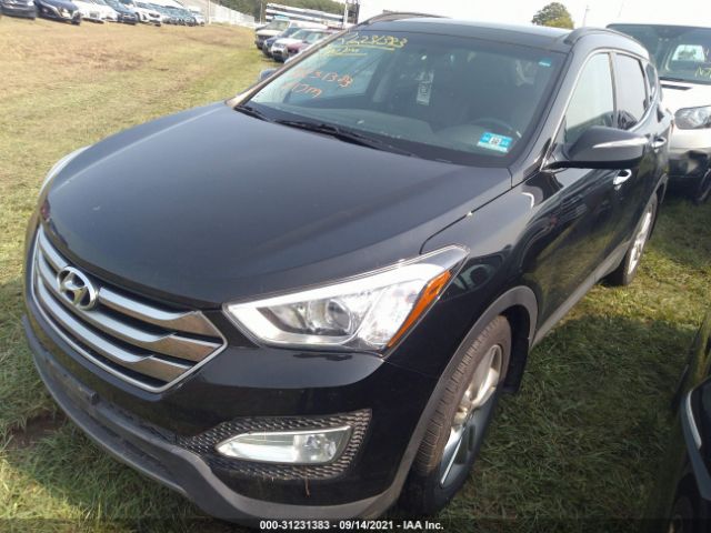 Photo 1 VIN: 5XYZWDLA9GG343122 - HYUNDAI SANTA FE SPORT 