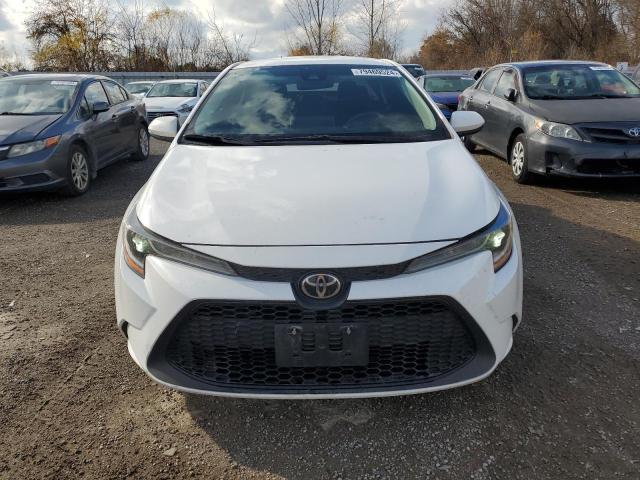 Photo 4 VIN: 5YFBPMBE7MP157122 - TOYOTA COROLLA LE 