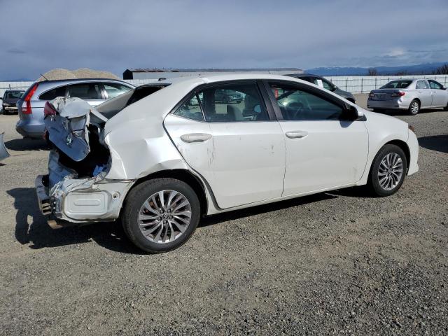 Photo 2 VIN: 5YFBPRHE2HP619418 - TOYOTA COROLLA LE 