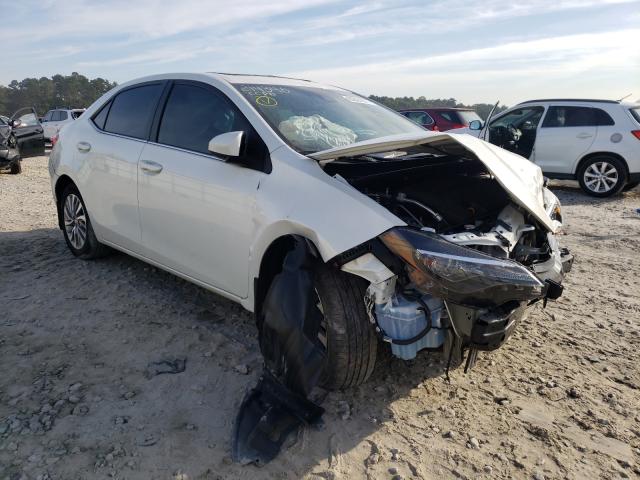 Photo 0 VIN: 5YFBPRHE2JP821777 - TOYOTA COROLLA LE 