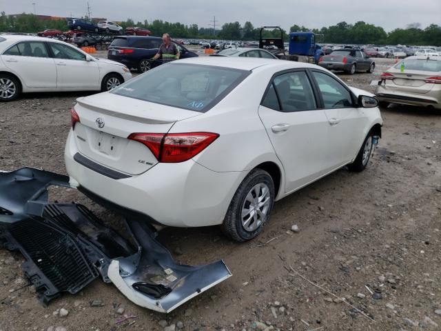 Photo 3 VIN: 5YFBPRHE4JP808559 - TOYOTA COROLLA LE 