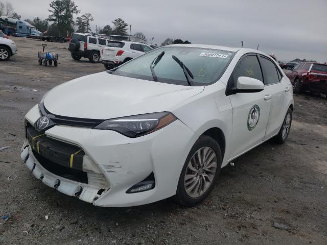 Photo 1 VIN: 5YFBPRHE7HP678402 - TOYOTA COROLLA LE 