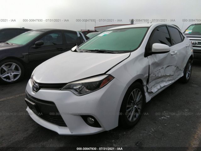 Photo 1 VIN: 5YFBURHE0EP087185 - TOYOTA COROLLA 