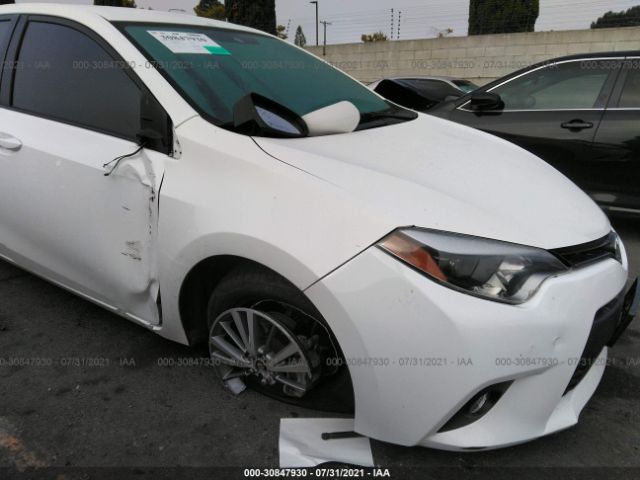 Photo 5 VIN: 5YFBURHE0EP087185 - TOYOTA COROLLA 