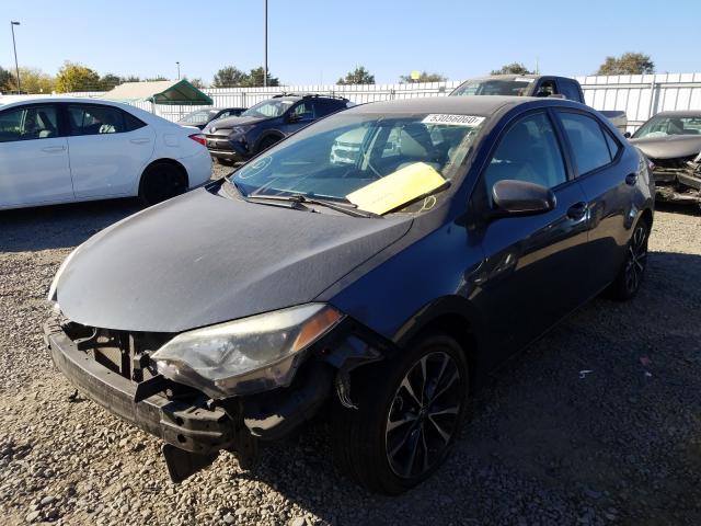 Photo 1 VIN: 5YFBURHE0EP093990 - TOYOTA COROLLA L 