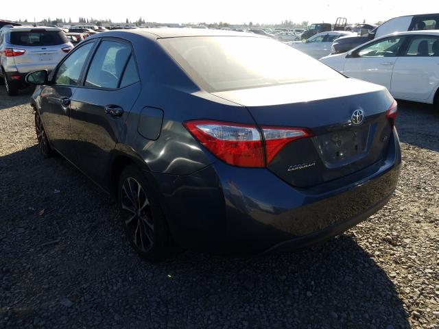 Photo 2 VIN: 5YFBURHE0EP093990 - TOYOTA COROLLA L 