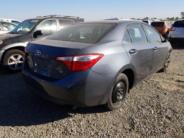 Photo 3 VIN: 5YFBURHE0EP093990 - TOYOTA COROLLA L 