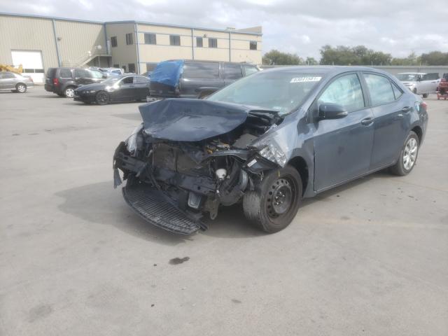 Photo 1 VIN: 5YFBURHE0EP147014 - TOYOTA COROLLA L 