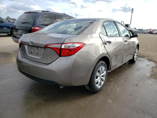 Photo 3 VIN: 5YFBURHE0GP366882 - TOYOTA COROLLA L 