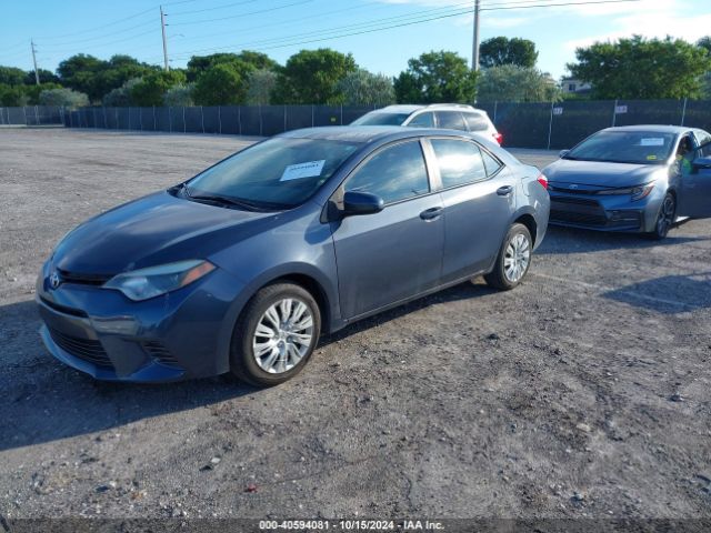 Photo 1 VIN: 5YFBURHE0GP381110 - TOYOTA COROLLA 