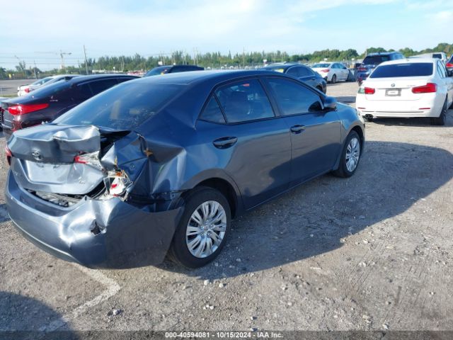 Photo 3 VIN: 5YFBURHE0GP381110 - TOYOTA COROLLA 