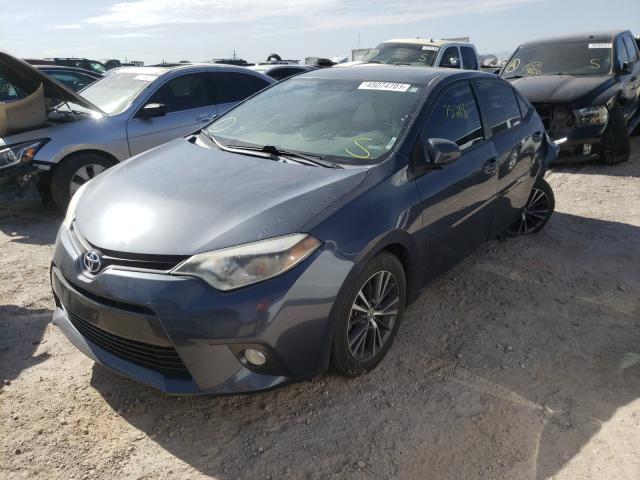 Photo 1 VIN: 5YFBURHE0GP386923 - TOYOTA COROLLA L 