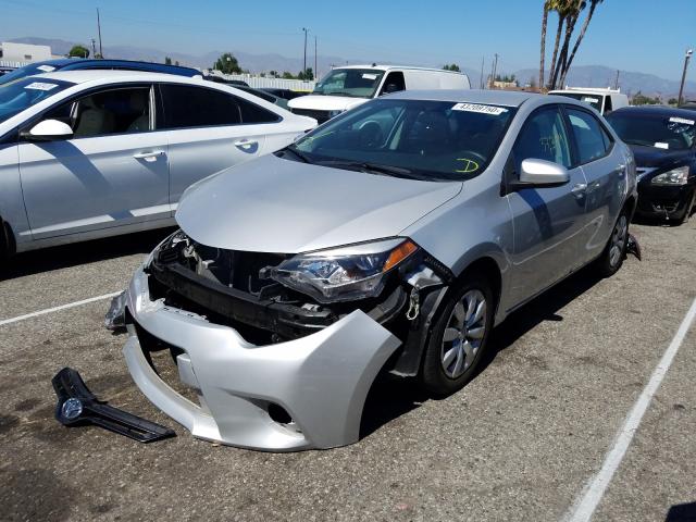 Photo 1 VIN: 5YFBURHE0GP387487 - TOYOTA COROLLA L 