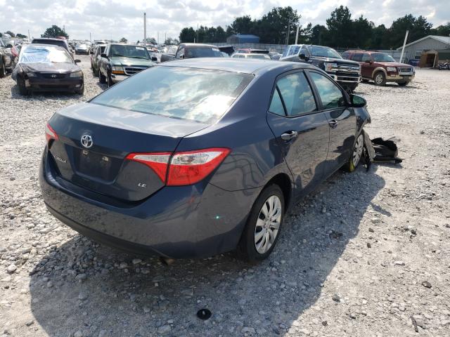 Photo 3 VIN: 5YFBURHE0GP395329 - TOYOTA COROLLA L 