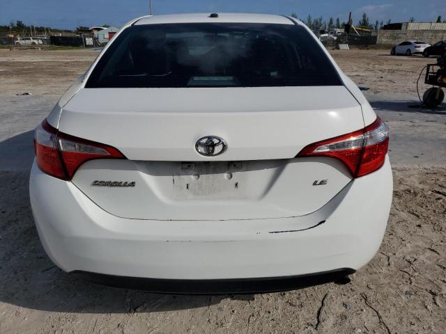 Photo 5 VIN: 5YFBURHE0GP407933 - TOYOTA COROLLA L 