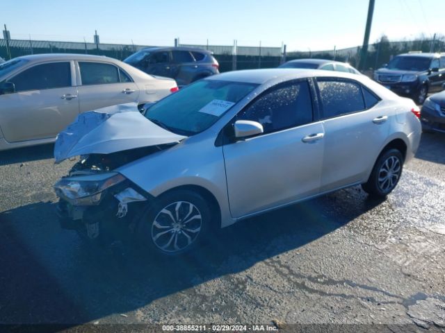 Photo 1 VIN: 5YFBURHE0GP409357 - TOYOTA COROLLA 