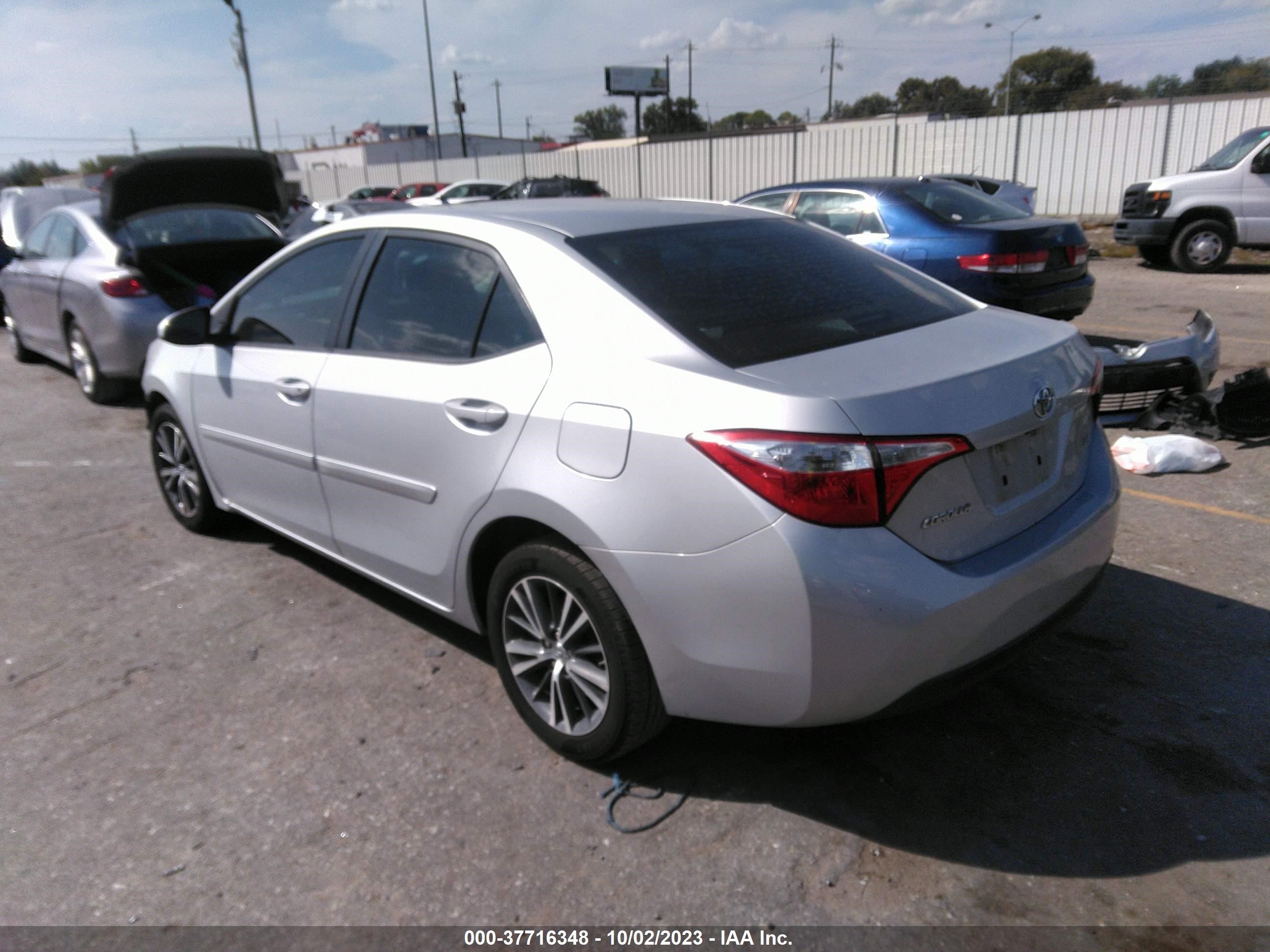 Photo 2 VIN: 5YFBURHE0GP417572 - TOYOTA COROLLA 