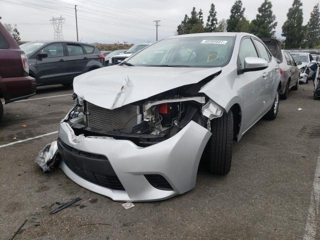 Photo 1 VIN: 5YFBURHE0GP428765 - TOYOTA COROLLA L 