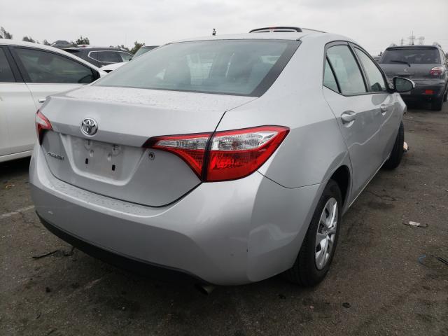 Photo 3 VIN: 5YFBURHE0GP428765 - TOYOTA COROLLA L 