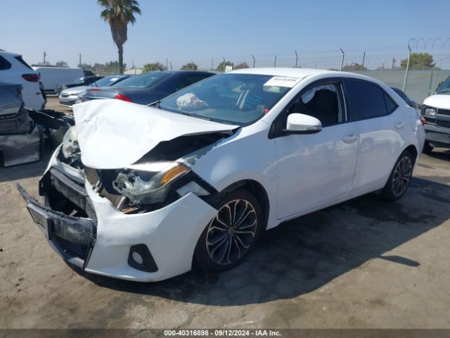 Photo 1 VIN: 5YFBURHE0GP429737 - TOYOTA COROLLA 