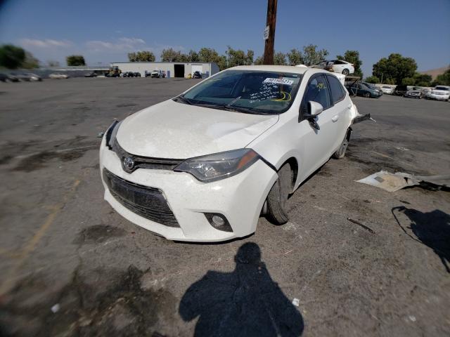 Photo 1 VIN: 5YFBURHE0GP452435 - TOYOTA COROLLA L 