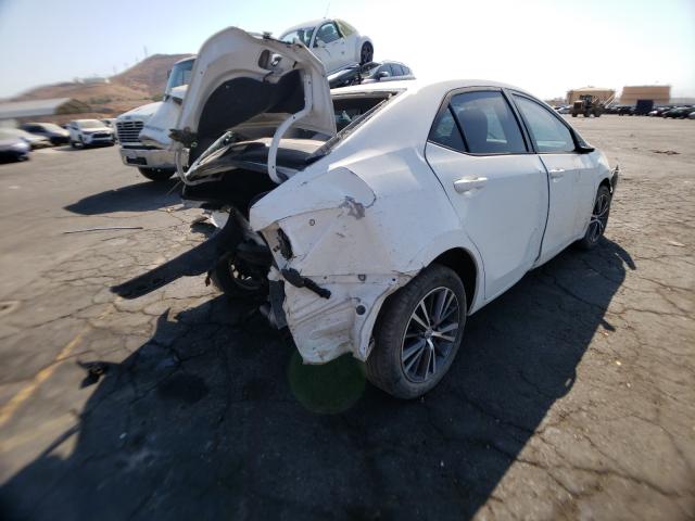 Photo 3 VIN: 5YFBURHE0GP452435 - TOYOTA COROLLA L 