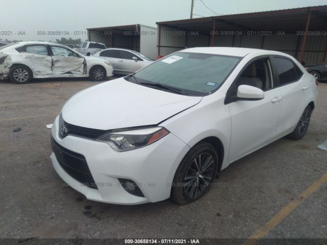 Photo 1 VIN: 5YFBURHE0GP471826 - TOYOTA COROLLA 