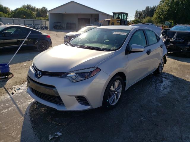 Photo 1 VIN: 5YFBURHE0GP481675 - TOYOTA COROLLA L 