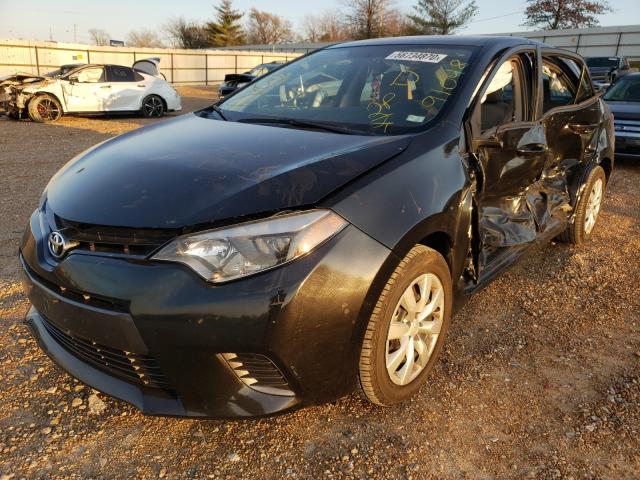 Photo 1 VIN: 5YFBURHE0GP494555 - TOYOTA COROLLA L 