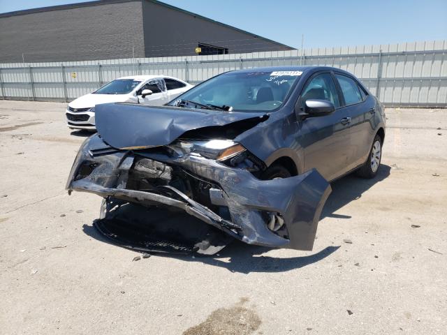 Photo 1 VIN: 5YFBURHE0GP496306 - TOYOTA COROLLA L 