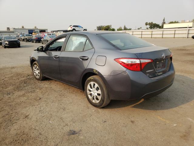 Photo 2 VIN: 5YFBURHE0GP498590 - TOYOTA COROLLA L 