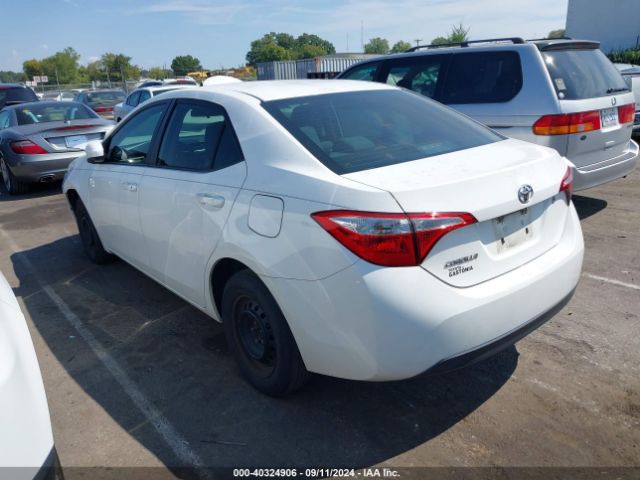 Photo 2 VIN: 5YFBURHE0GP500631 - TOYOTA COROLLA 