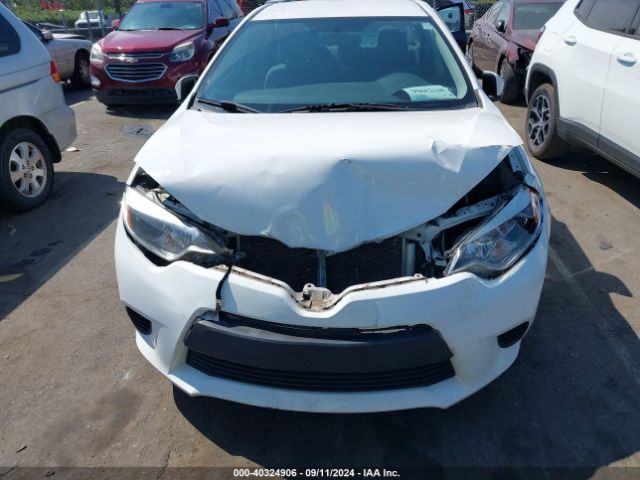 Photo 5 VIN: 5YFBURHE0GP500631 - TOYOTA COROLLA 