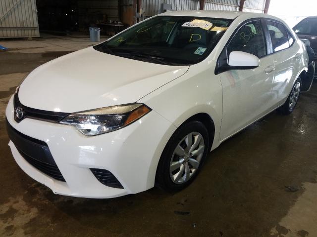 Photo 1 VIN: 5YFBURHE0GP513203 - TOYOTA COROLLA L 