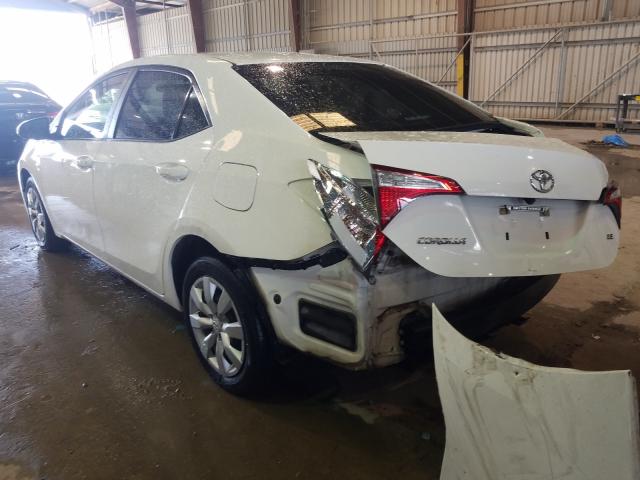 Photo 2 VIN: 5YFBURHE0GP513203 - TOYOTA COROLLA L 