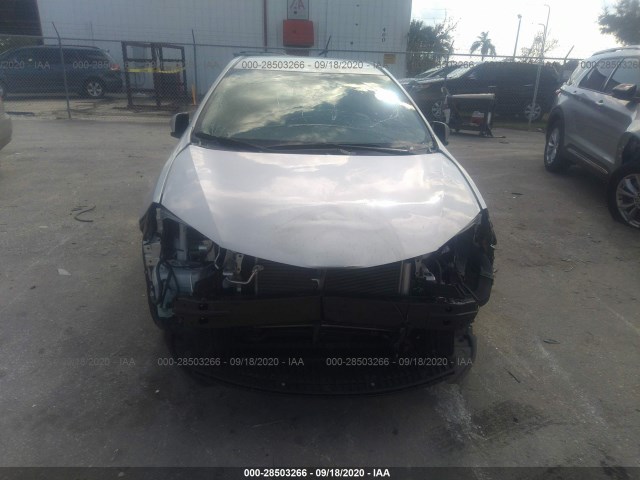 Photo 5 VIN: 5YFBURHE0GP567651 - TOYOTA COROLLA 