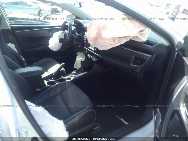 Photo 4 VIN: 5YFBURHE0GP567990 - TOYOTA COROLLA 