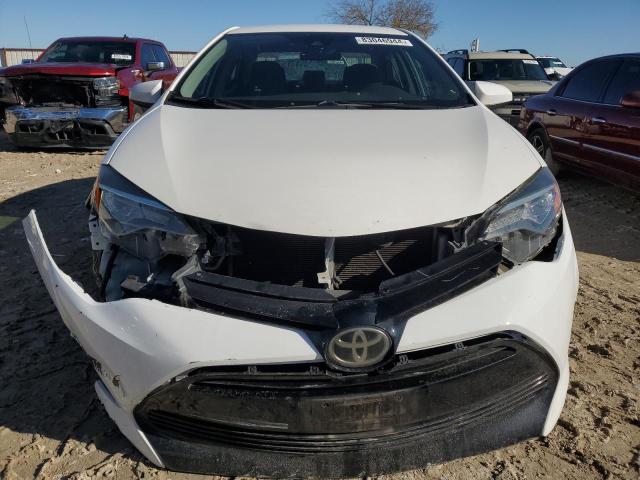 Photo 4 VIN: 5YFBURHE0HP602335 - TOYOTA COROLLA L 