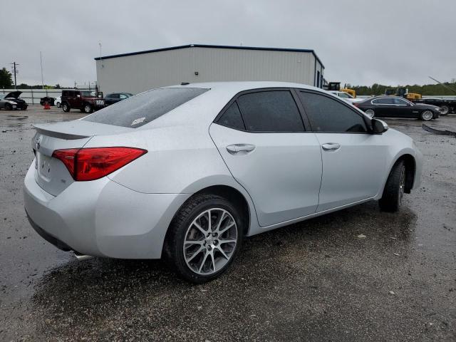 Photo 2 VIN: 5YFBURHE0HP614369 - TOYOTA COROLLA L 